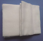 Cotton pad with absorbent gauze